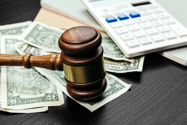 Do CEO Pay Cuts Undermine Trust in Earnings?