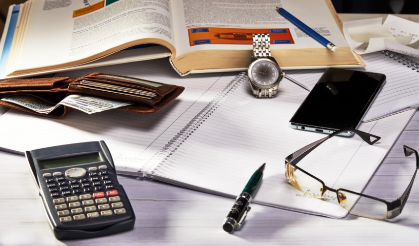 The Impact of In-House Tax Function Status on Corporate Tax Strategies